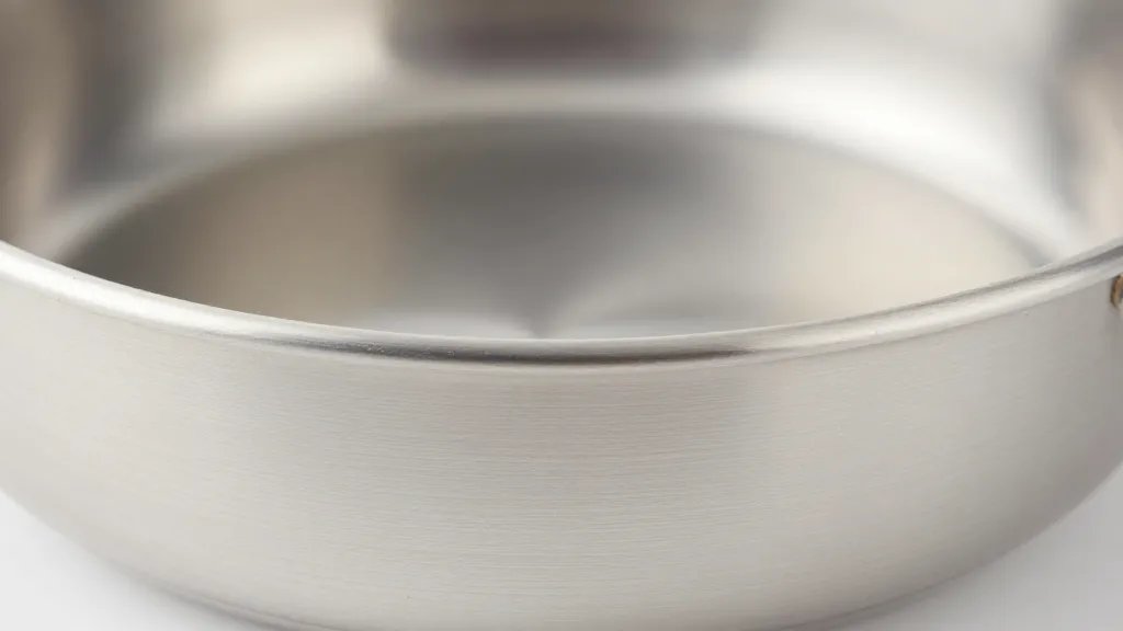 What Is a Nonreactive Pan and Why It Matters in Cooking 3 closeup of enamel-coated nonreactive pan rim and exterior