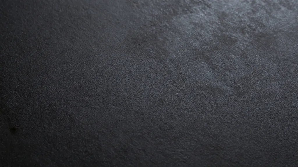 What Is a Dark or Coated Pan? Unveil the Secret to Perfect Searing 4 Closeup of seasoned dark pan surface texture