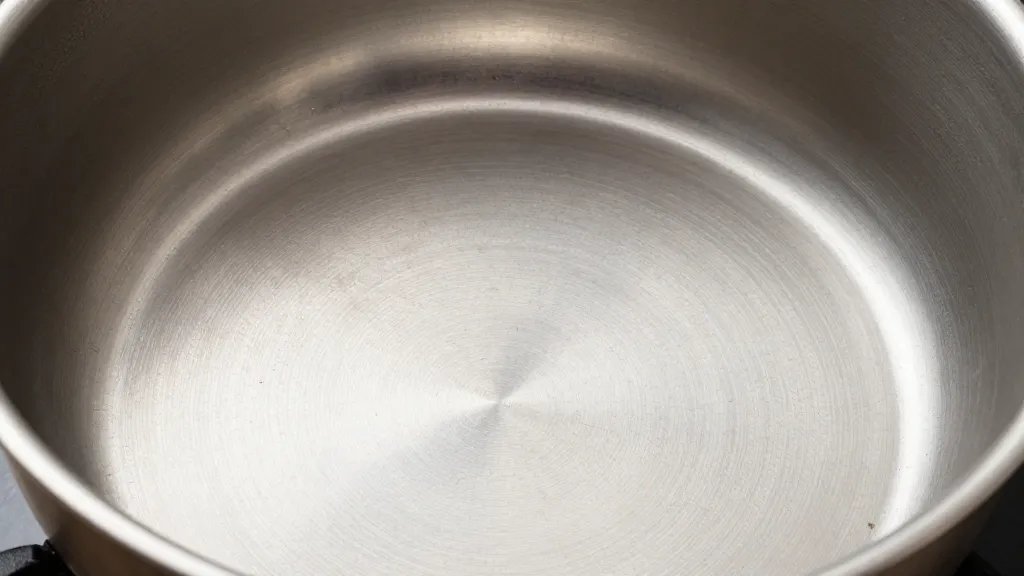 What Is a Braising Pan and Why It Rocks 4 closeup of braided enamel coating on braising pan interior