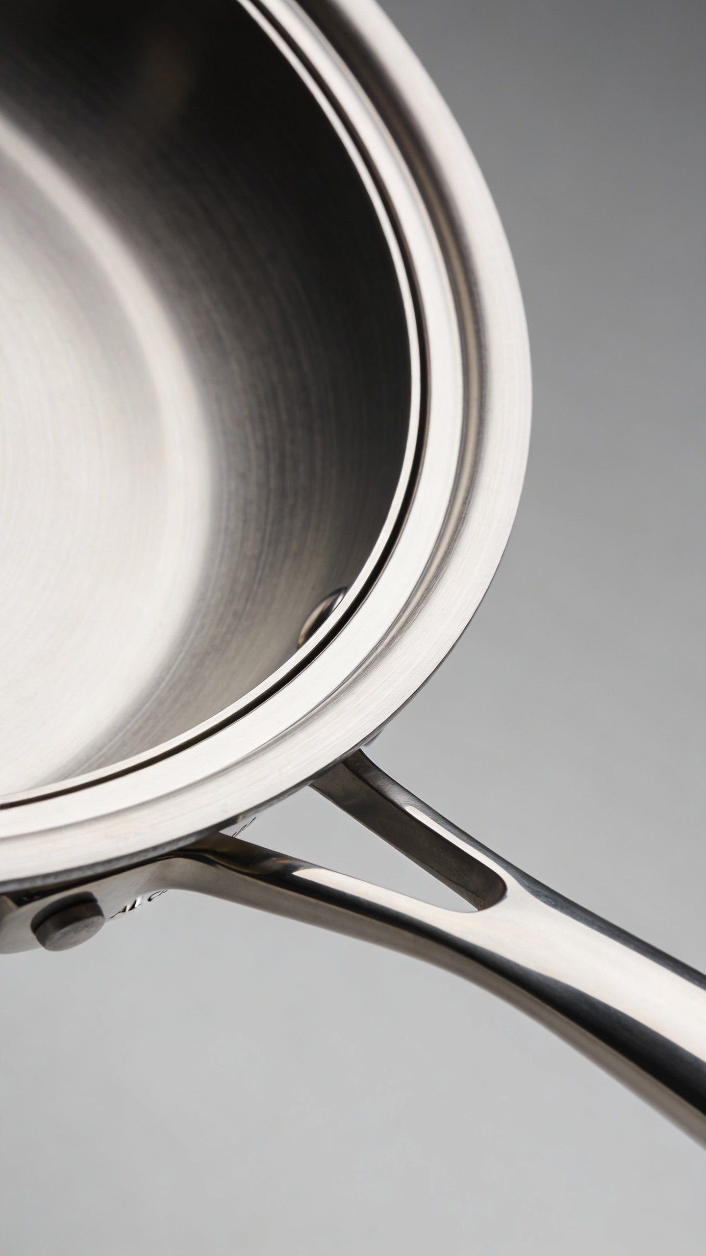 All Clad D3 Vs D5: Which Pan Wins for Your Kitchen 2 Closeup of a single All-Clad D3 frying pan edge revealing tri-ply build