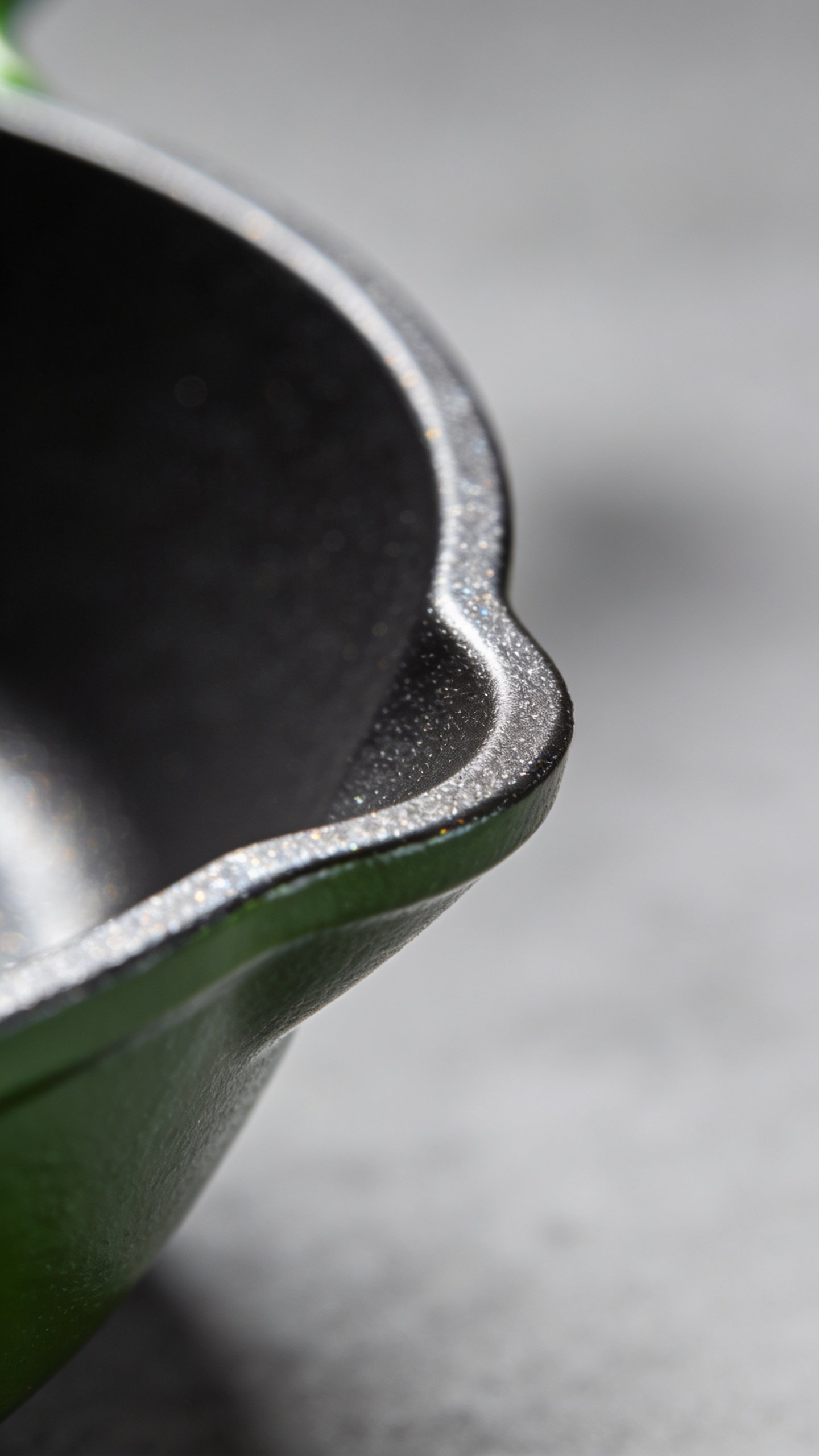 Greenpan Vs Greenlife: Which Cookware Lasts Longer 2 Closeup of GreenPan ceramic nonstick coating on skillet edge