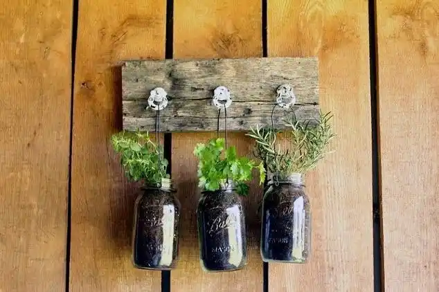 Brighten Your Windowsill with 15 Unique Herb Planter Ideas 6 mason jar planters