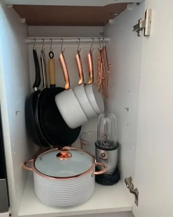 11 Rental-Friendly Kitchen Hacks For Apartments 3 tension rod