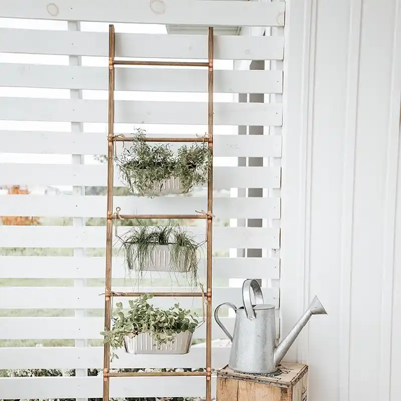 10 Modern Herb Garden Design Concepts for Your Home 2 copper ladder