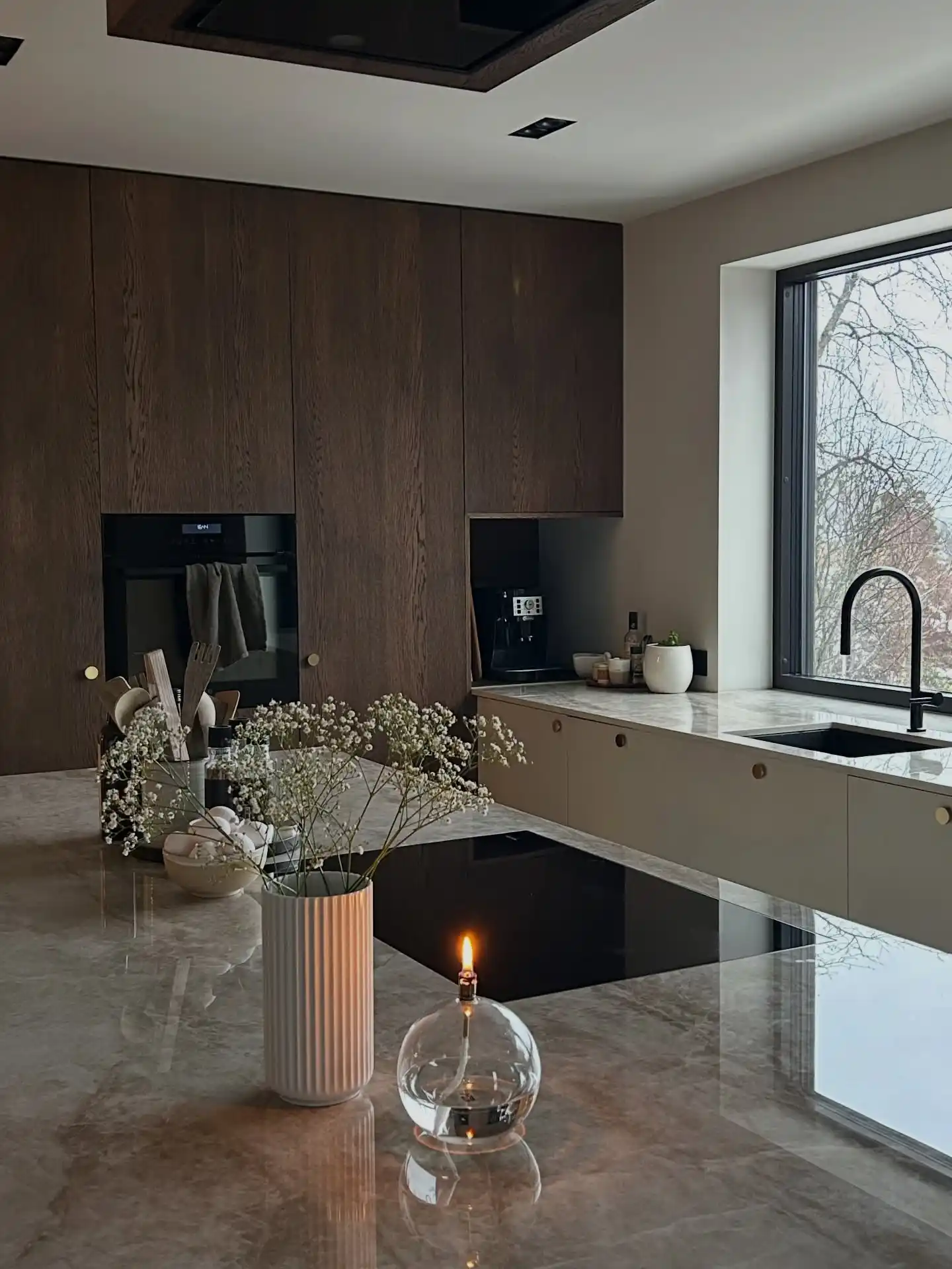 12 Sleek Ideas For Minimalist Kitchen Organization For Men 11 dark wood scandi kitchen